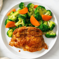 Quick and easy chicken thighs with roasted broccoli, perfect for busy weeknights.
